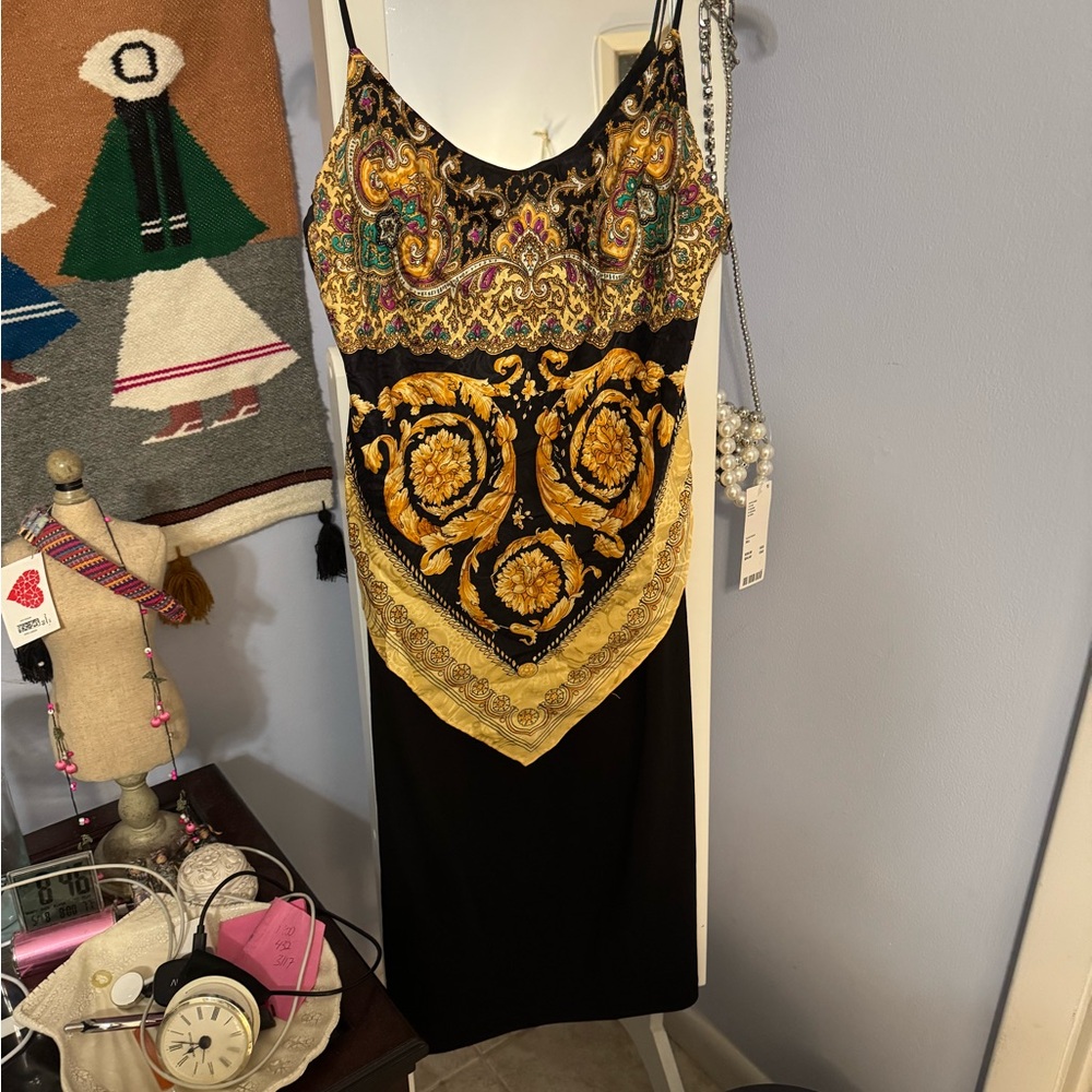 Silk top over dress!!  . Elegant Black and Gold Dress with Intricate Patterns